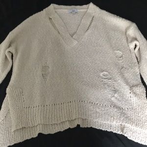 Distressed cream colored sweater